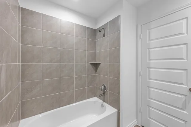 a bathroom with a bathtub