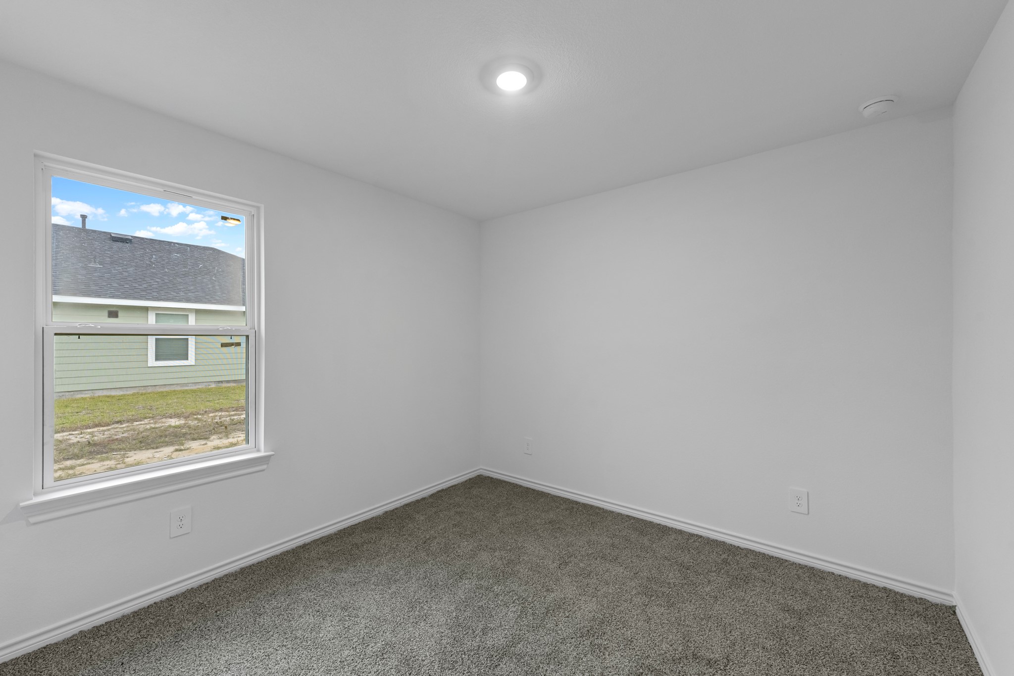 5650 Spoonbill Orange, TX 77632 - Photo 20 of 26 an empty room with a window