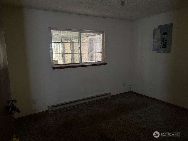 314 Liberty Avenue Granger, WA 98932 - Photo 16 of 26 an empty room with a window