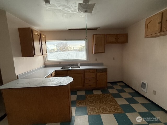 314 Liberty Avenue Granger, WA 98932 - Photo 26 of 26 a bathroom with a granite countertop sink and a mirror