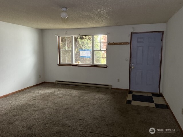 314 Liberty Avenue Granger, WA 98932 - Photo 10 of 26 an empty room with a window