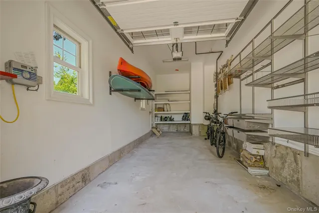 a view of a house with a yard and garden