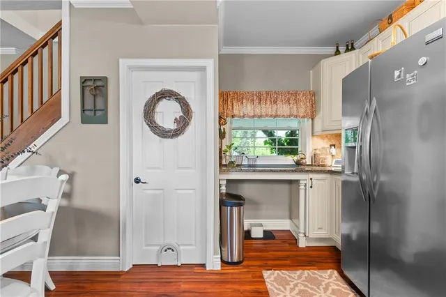 a view of living room with furniture and window
