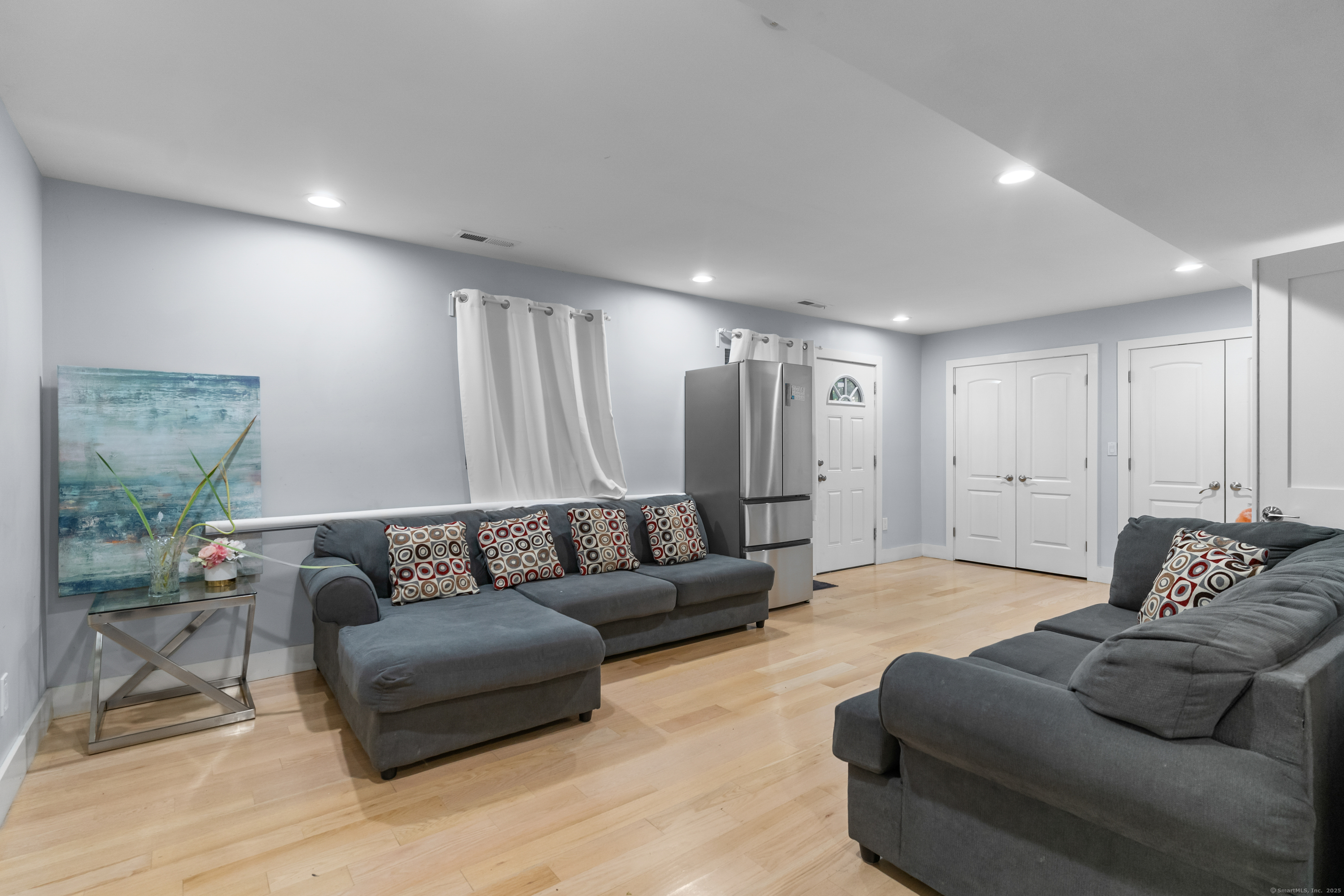 123 Exeter Street Bridgeport, CT 06606 - Photo 20 of 26 a living room with furniture and a couch