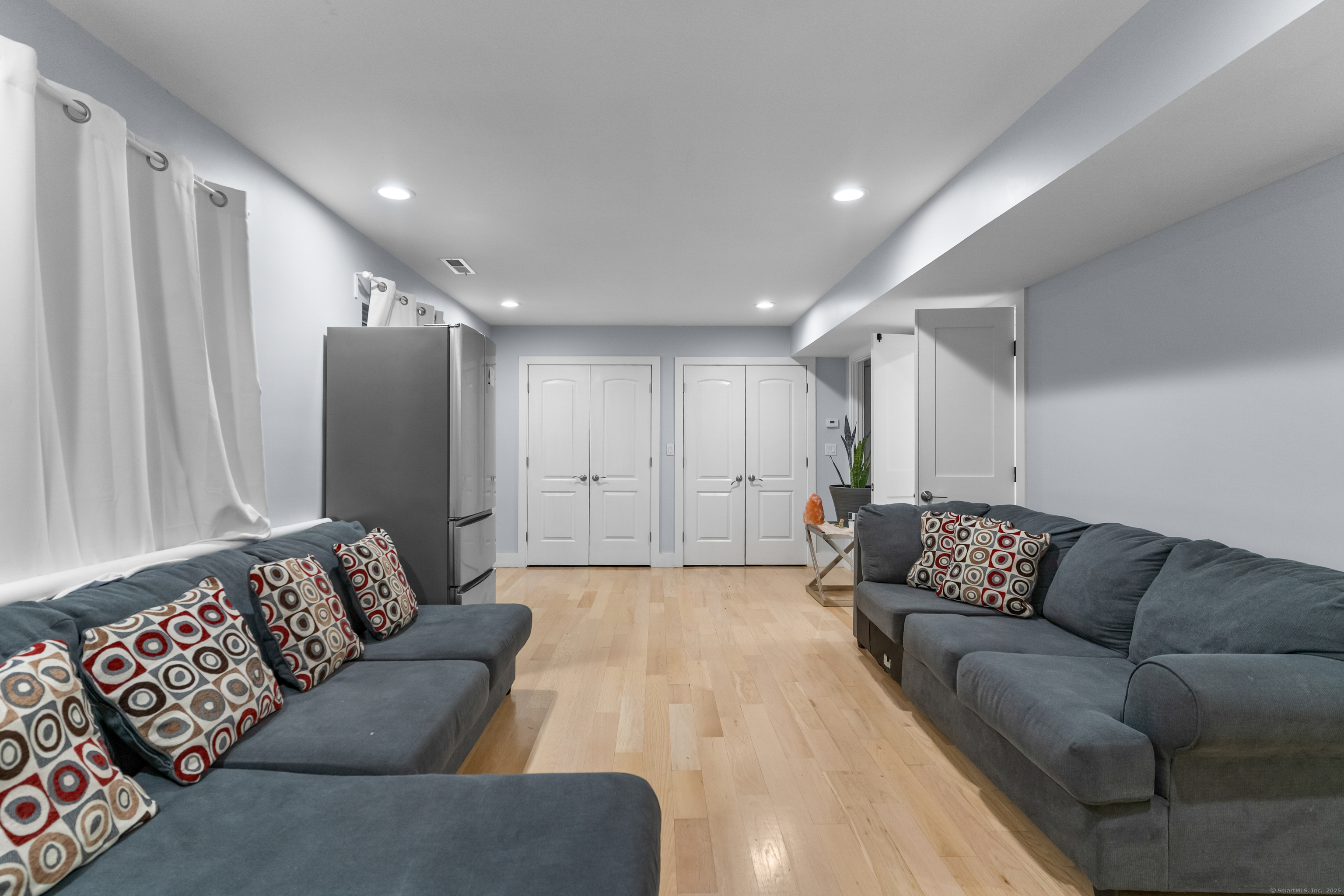 123 Exeter Street Bridgeport, CT 06606 - Photo 21 of 26 a living room with furniture and a couch