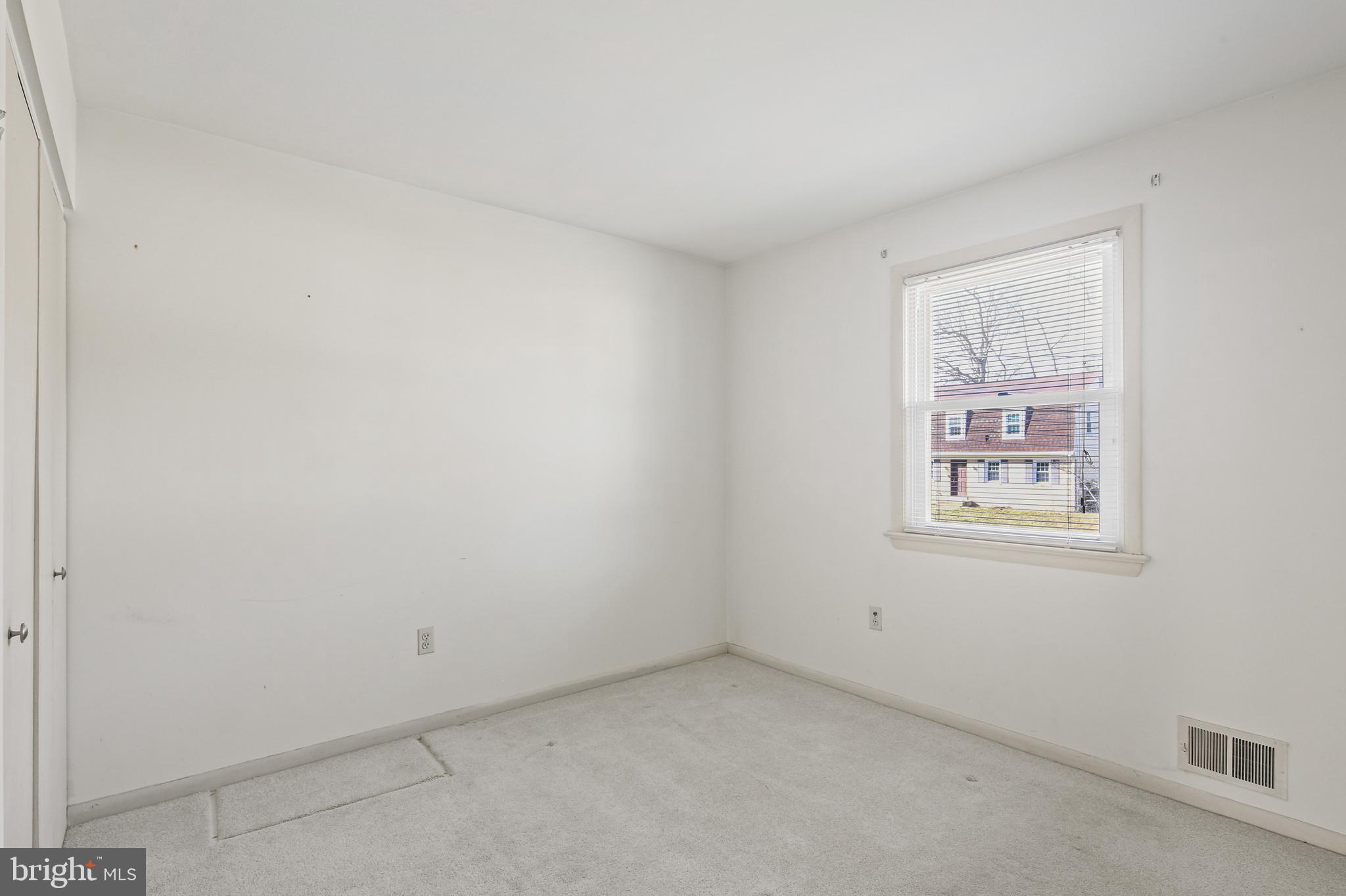 6215 Roblynn Road Laurel, MD 20707 - Photo 17 of 38 an empty room with a window