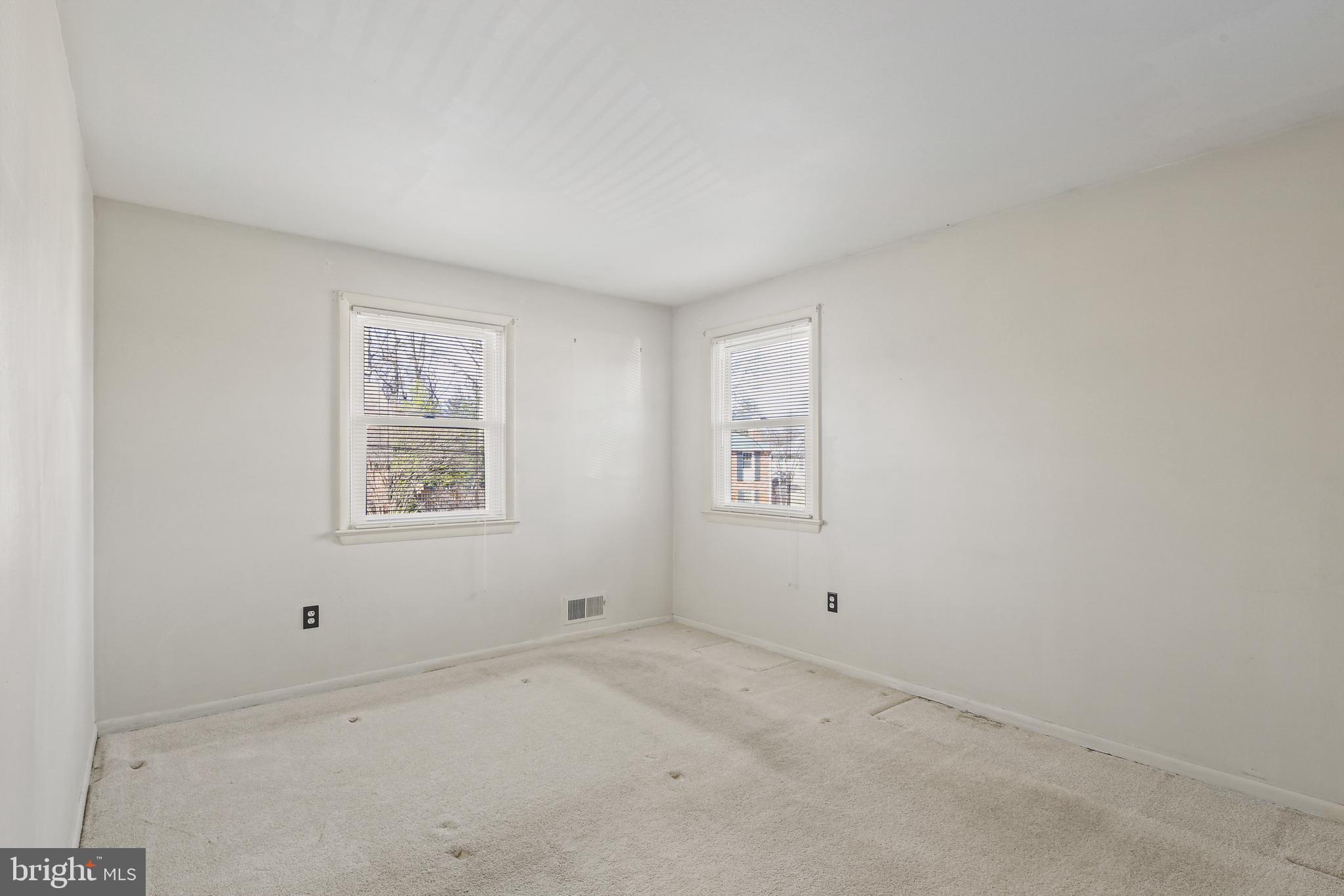 6215 Roblynn Road Laurel, MD 20707 - Photo 18 of 38 an empty room with windows