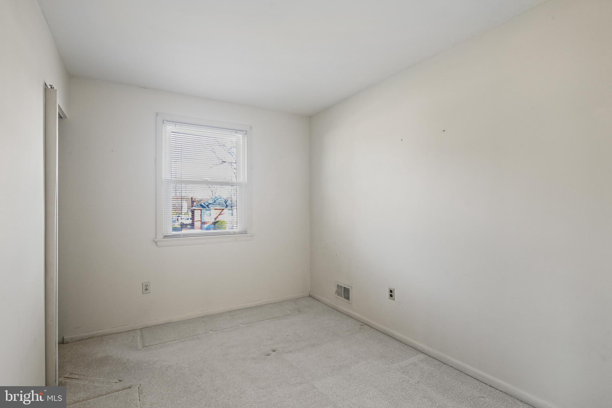 6215 Roblynn Road Laurel, MD 20707 - Photo 20 of 38 an empty room with a window