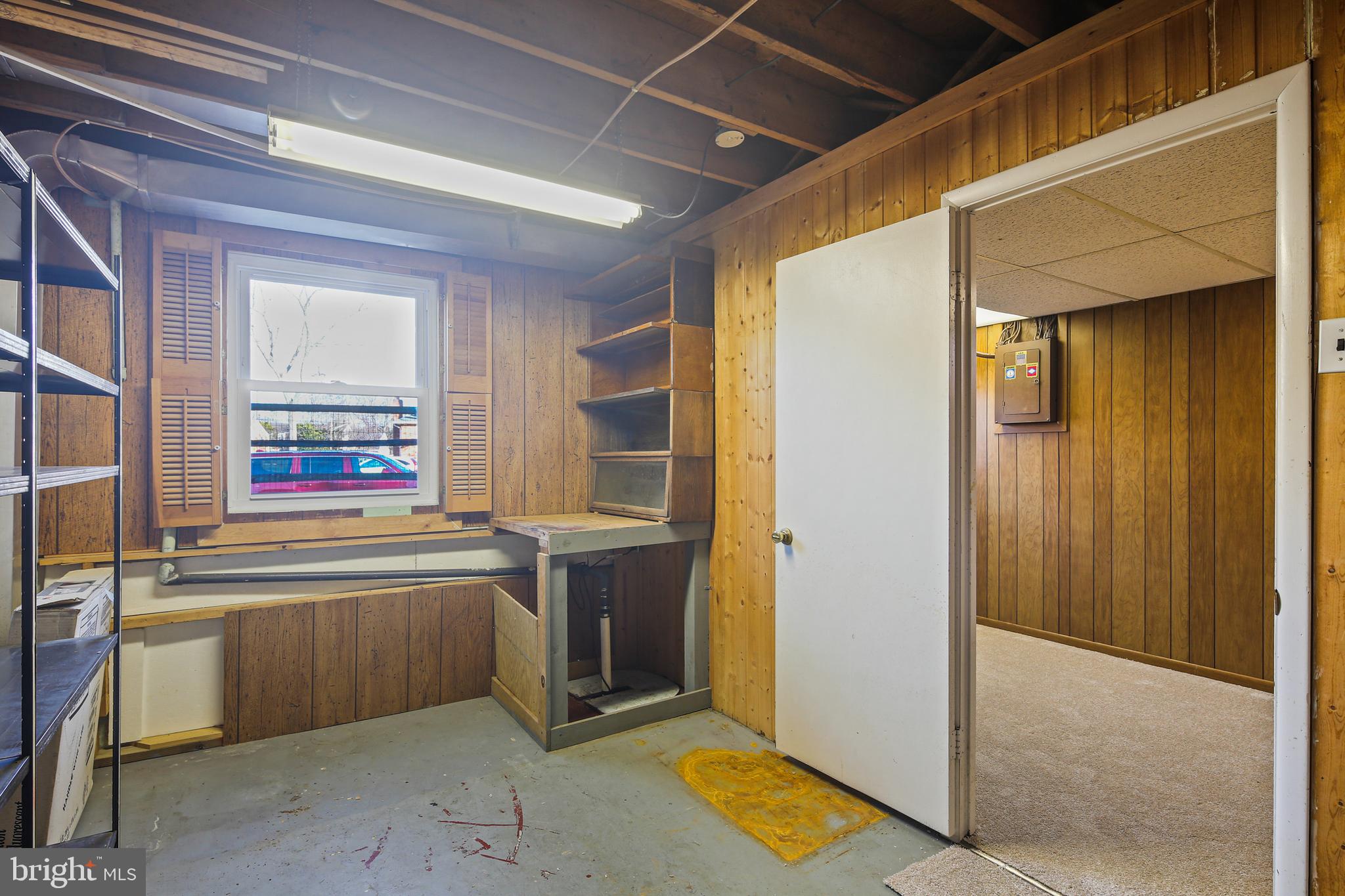 6215 Roblynn Road Laurel, MD 20707 - Photo 30 of 38 a view of a bathroom with tub and window