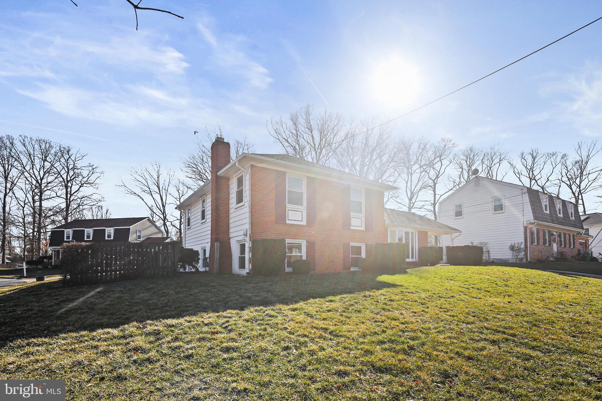 6215 Roblynn Road Laurel, MD 20707 - Photo 34 of 38 a front view of a house with a yard
