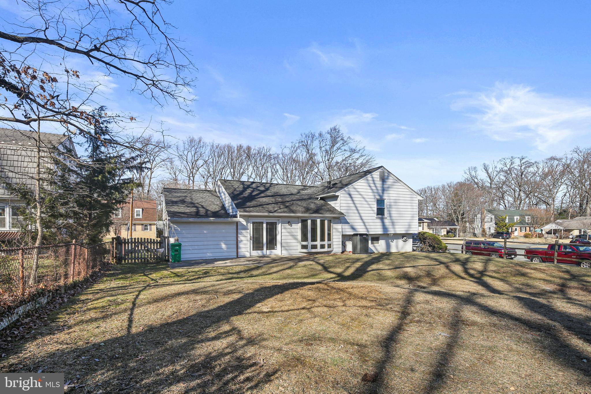 6215 Roblynn Road Laurel, MD 20707 - Photo 36 of 38 a view of residential houses with yard and mountain view in back
