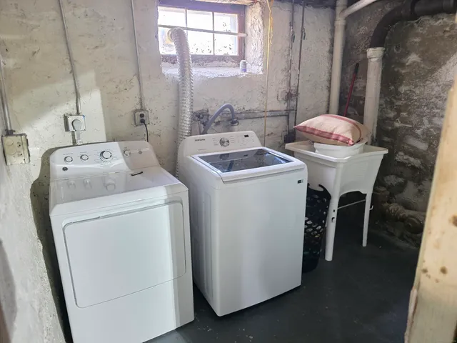 a view of balcony with wooden floor and fence