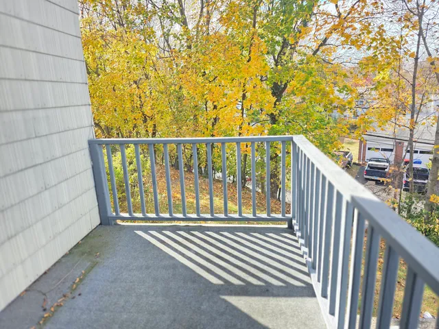a view of street along with trees