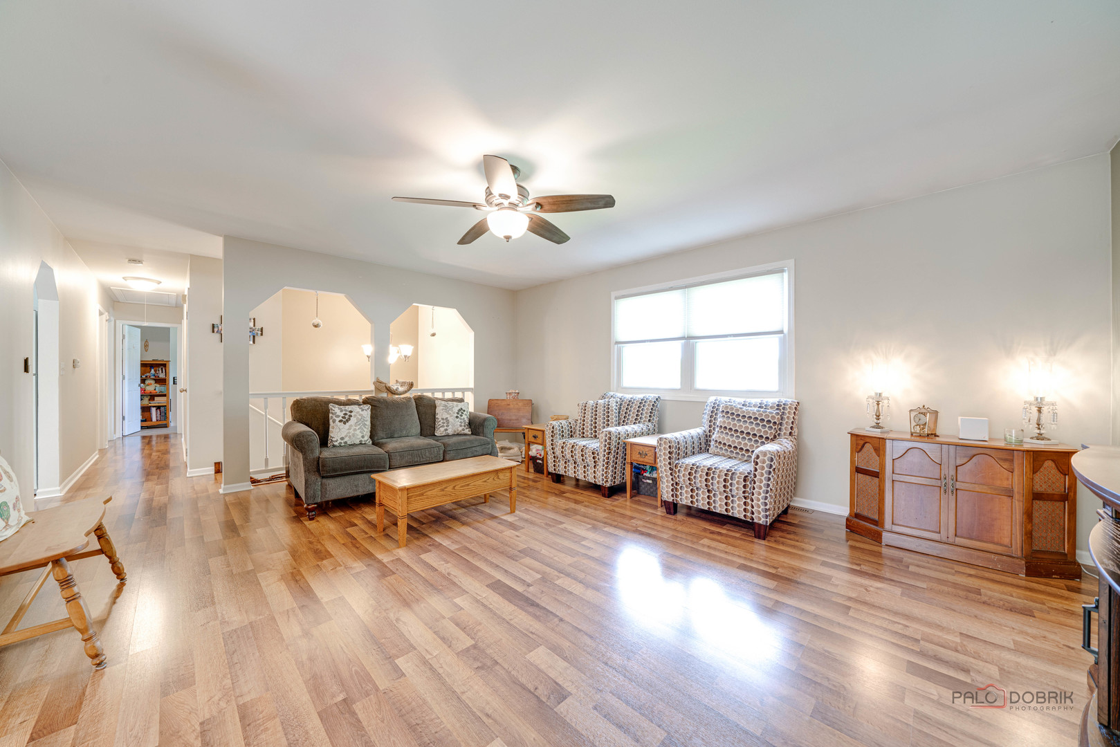 6720 Hunters Path Cary, IL 60013 - Photo 7 of 33 a living room with furniture and a large window