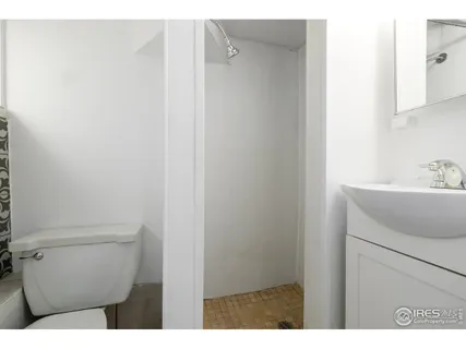 a bathroom with a sink toilet and