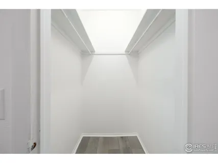 a view of small space with racks on the wall