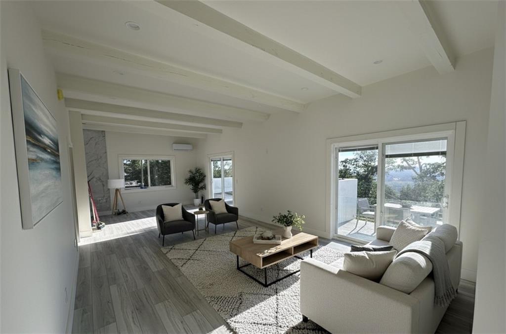 966 Wauka Ridge Road Cleveland, GA 30528 - Photo 12 of 16 a living room with furniture and a table