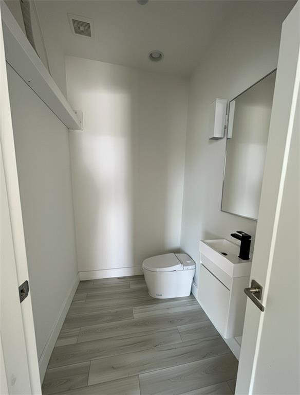 966 Wauka Ridge Road Cleveland, GA 30528 - Photo 16 of 16 a bathroom with a sink and a toilet