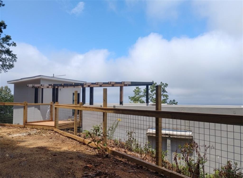 966 Wauka Ridge Road Cleveland, GA 30528 - Photo 6 of 16 a view of a house with a balcony