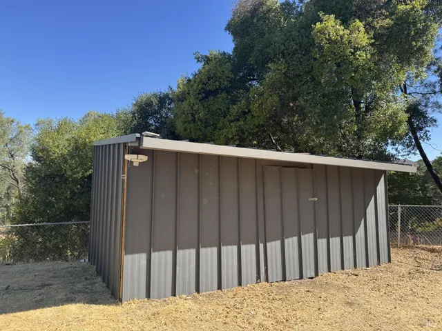 a view of a wooden fence