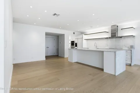 a utility room with cabinets