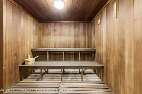 a view of a balcony with wooden floor