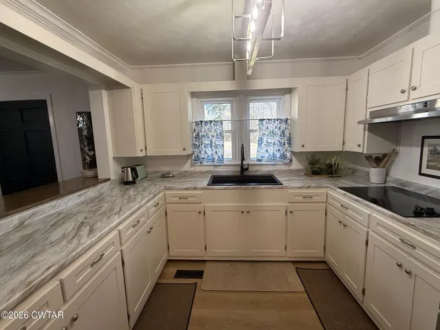 a view of a house with a park