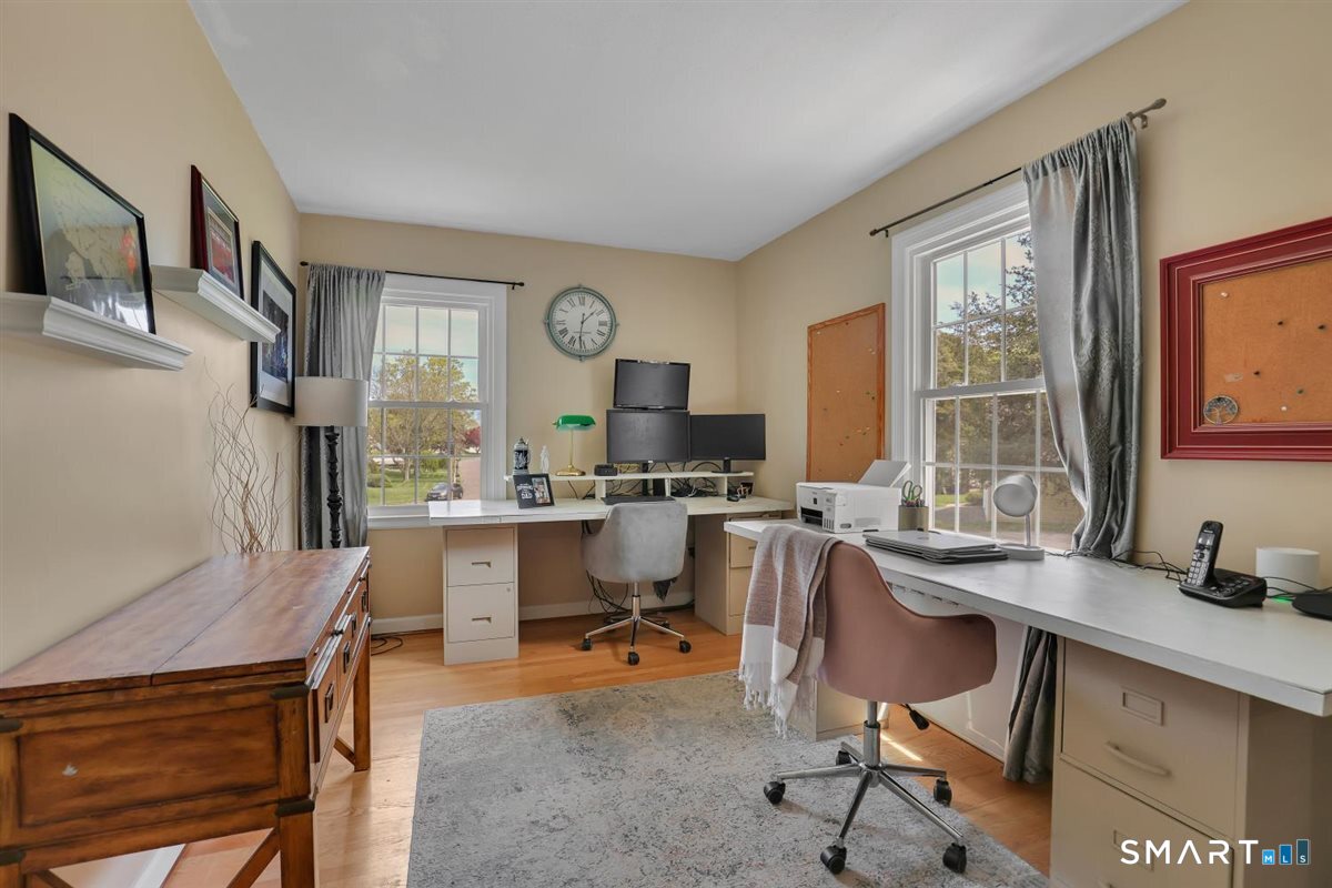 72 Old Post Road Wethersfield, CT 06109 - Photo 13 of 40 a view of a workspace with furniture and a window
