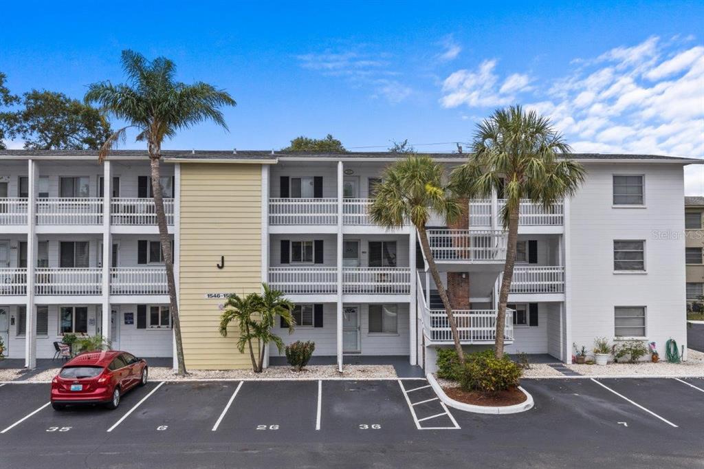 1570 Pleasant Road, Unit J26 Bradenton, FL 34207 - Photo 1 of 1 Front Elevation of Building J. The unit is located on the second floor. The door is centered on the photo.