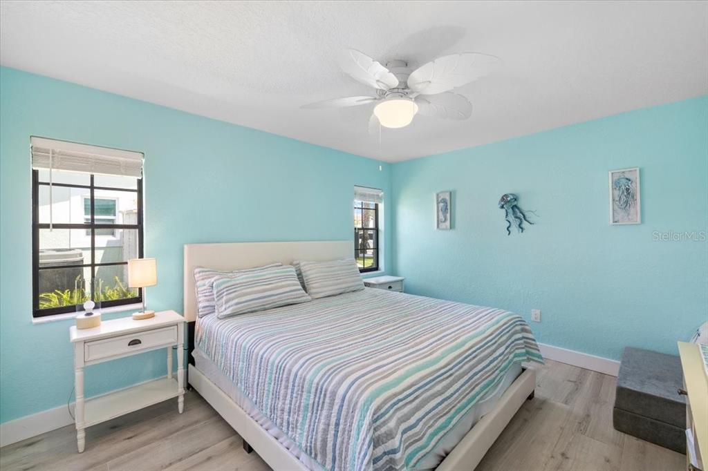 4400 Flexer Drive Hernando Beach, FL 34607 - Photo 22 of 49 a bedroom with a bed and a window