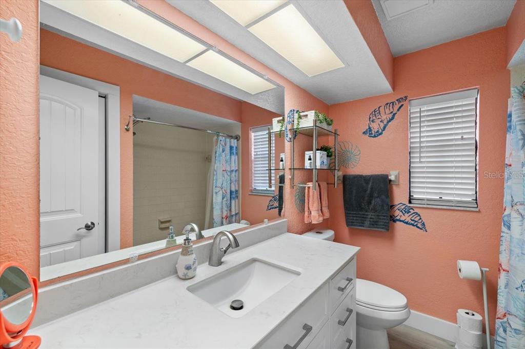 4400 Flexer Drive Hernando Beach, FL 34607 - Photo 24 of 49 a bathroom with a sink toilet and shower