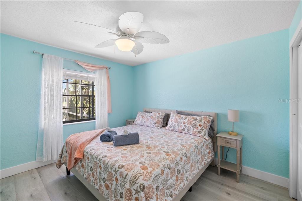 4400 Flexer Drive Hernando Beach, FL 34607 - Photo 25 of 49 a bedroom with a bed and a window