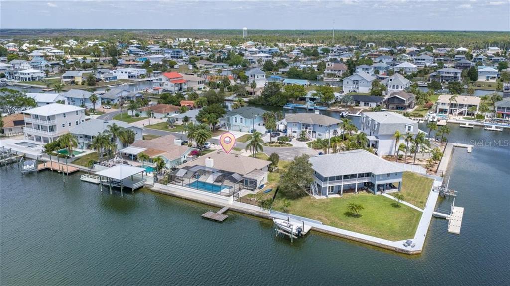 4400 Flexer Drive Hernando Beach, FL 34607 - Photo 39 of 49 an aerial view of a house with a lake view