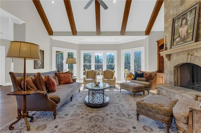 a large kitchen with granite countertop a sink counter space cabinets and stainless steel appliances