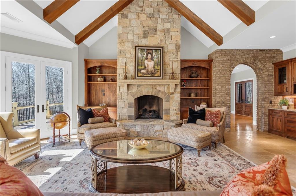 1086 Arbor Hill Road Canton, GA 30115 - Photo 18 of 98 a living room with furniture and a fireplace