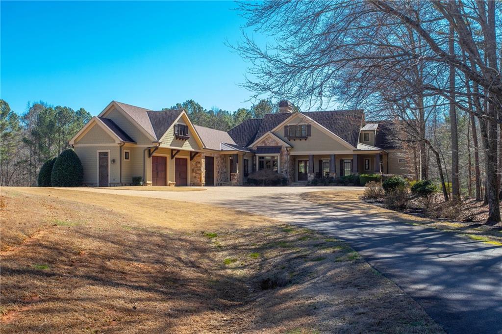 1086 Arbor Hill Road Canton, GA 30115 - Photo 2 of 98 a front view of a house with a yard