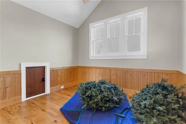 a view of a house with a yard and tree s