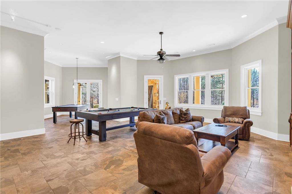 1086 Arbor Hill Road Canton, GA 30115 - Photo 62 of 98 a living room with furniture and a large window