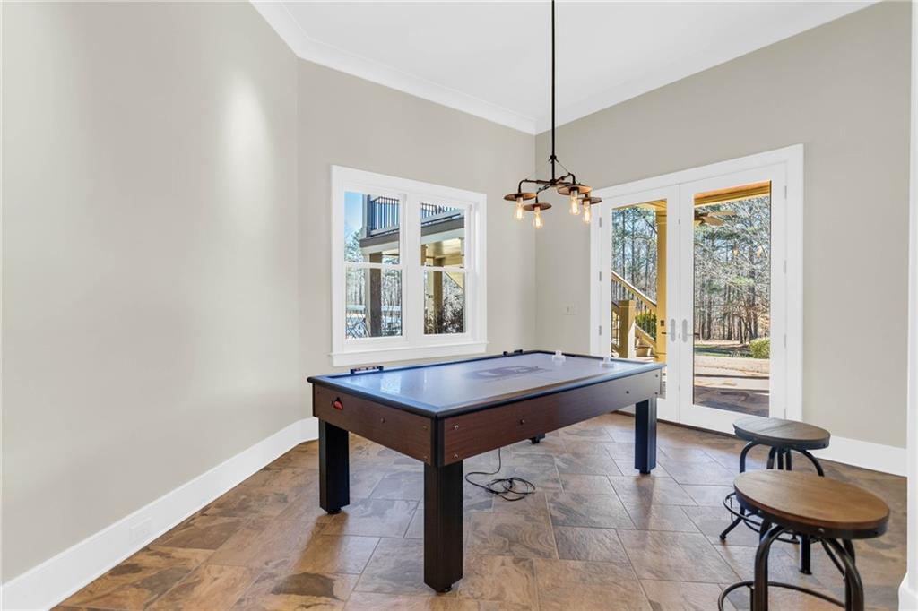 1086 Arbor Hill Road Canton, GA 30115 - Photo 64 of 98 a room with a table and windows