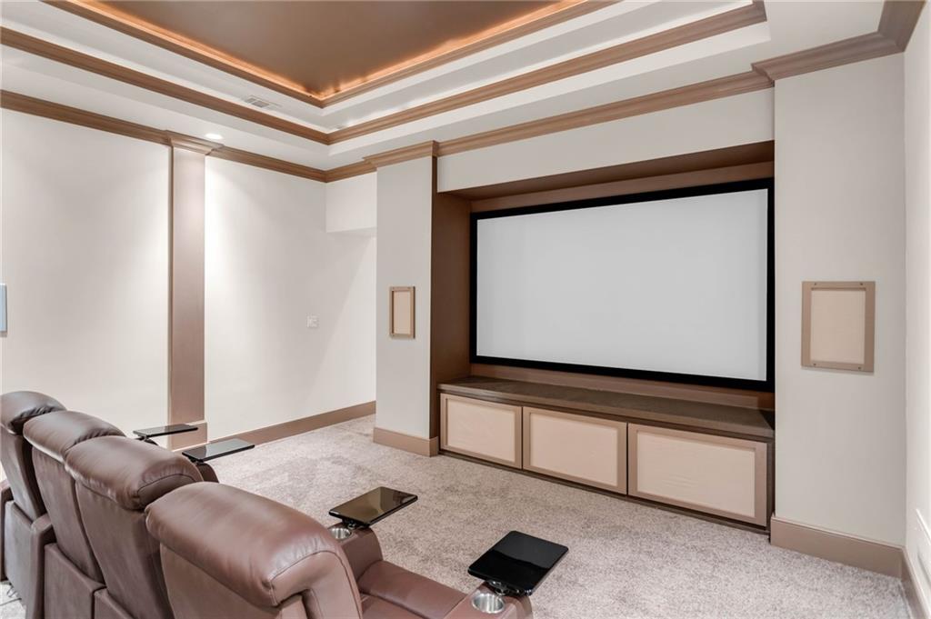 1086 Arbor Hill Road Canton, GA 30115 - Photo 66 of 98 a living room with furniture and a flat screen tv