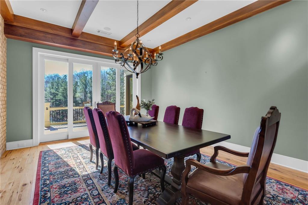 1086 Arbor Hill Road Canton, GA 30115 - Photo 9 of 98 a view of a dining room with furniture window and outside view