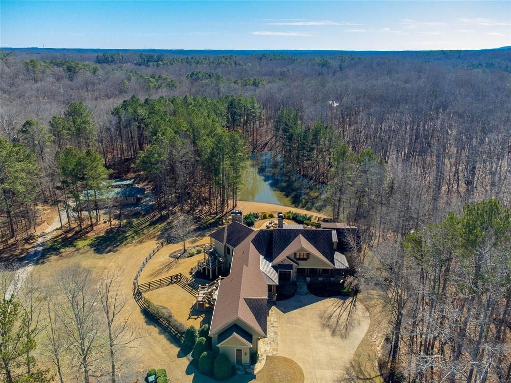 1086 Arbor Hill Road Canton, GA 30115 - Photo 96 of 98 an aerial view of a house with a yard