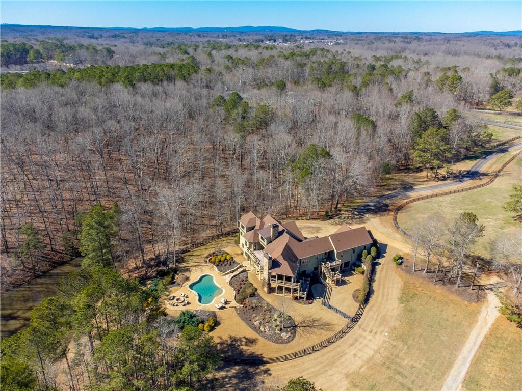 1086 Arbor Hill Road Canton, GA 30115 - Photo 97 of 98 an aerial view of a house with a yard