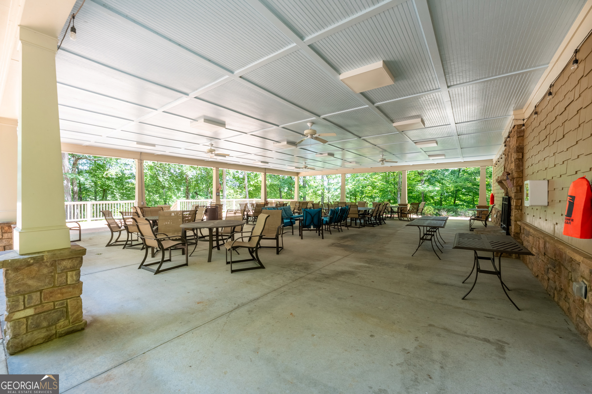 1071 Southern Pne Road Greensboro, GA 30642 - Photo 31 of 35 a view of a tables and chairs in patio