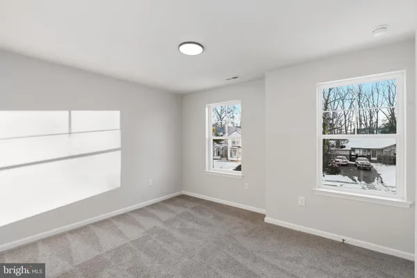 a view of a room that has a window in it