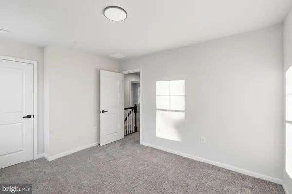 a view of a livingroom and a window