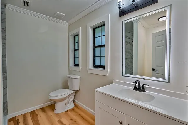 a bathroom with a sink and a toilet