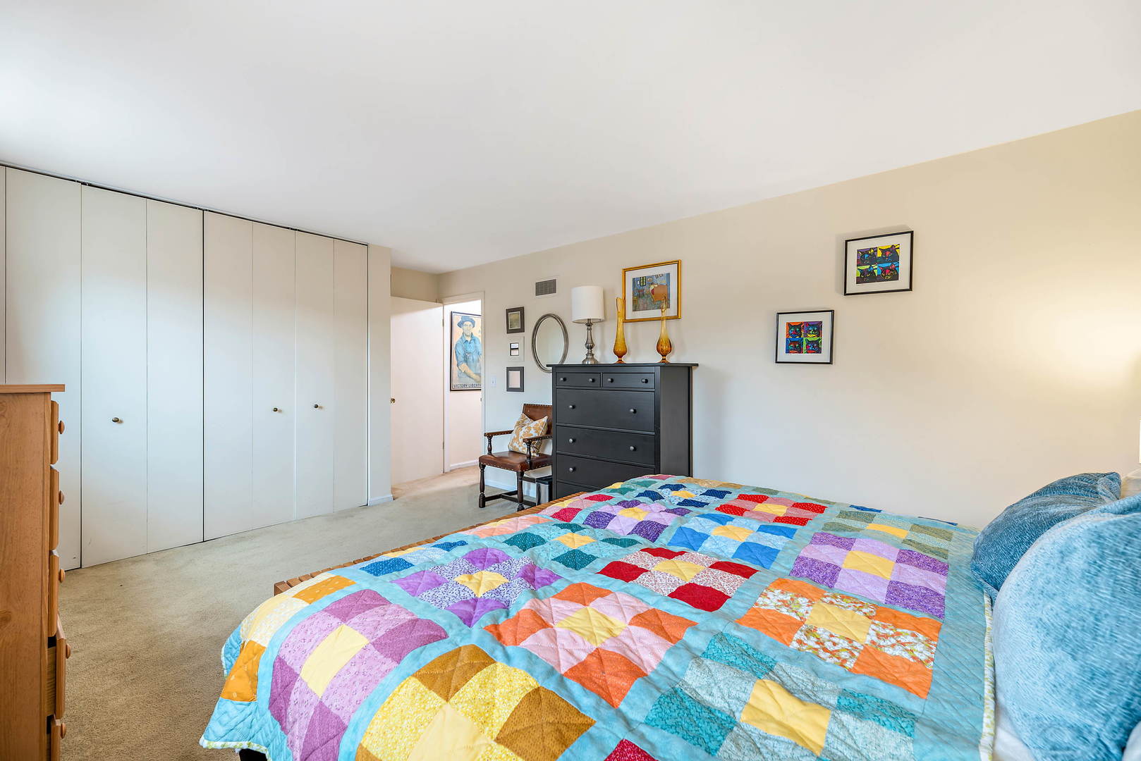 2142 Rugen Road, Unit C Glenview, IL 60026 - Photo 13 of 24 a bedroom with a bed and wooden floor