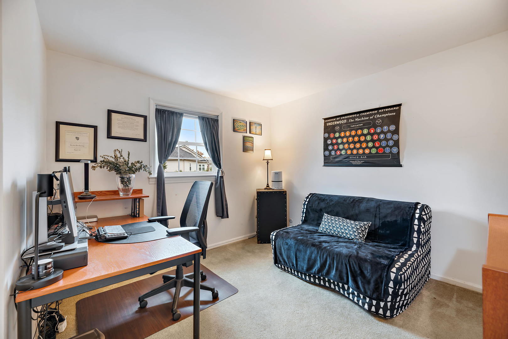 2142 Rugen Road, Unit C Glenview, IL 60026 - Photo 16 of 24 a living room with furniture a desk and chair with the bookshelf