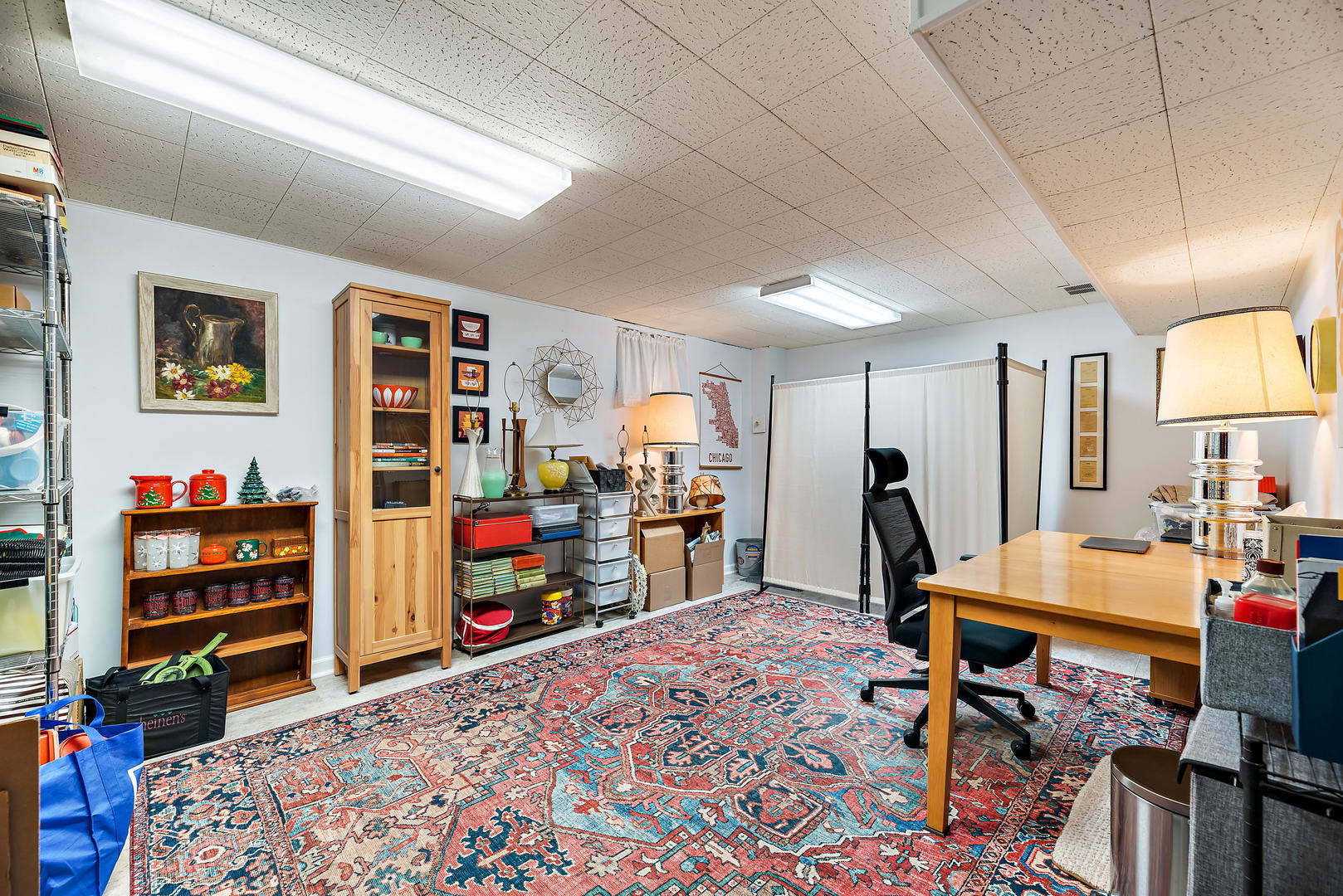 2142 Rugen Road, Unit C Glenview, IL 60026 - Photo 18 of 24 a room with furniture a rug and a book shelf